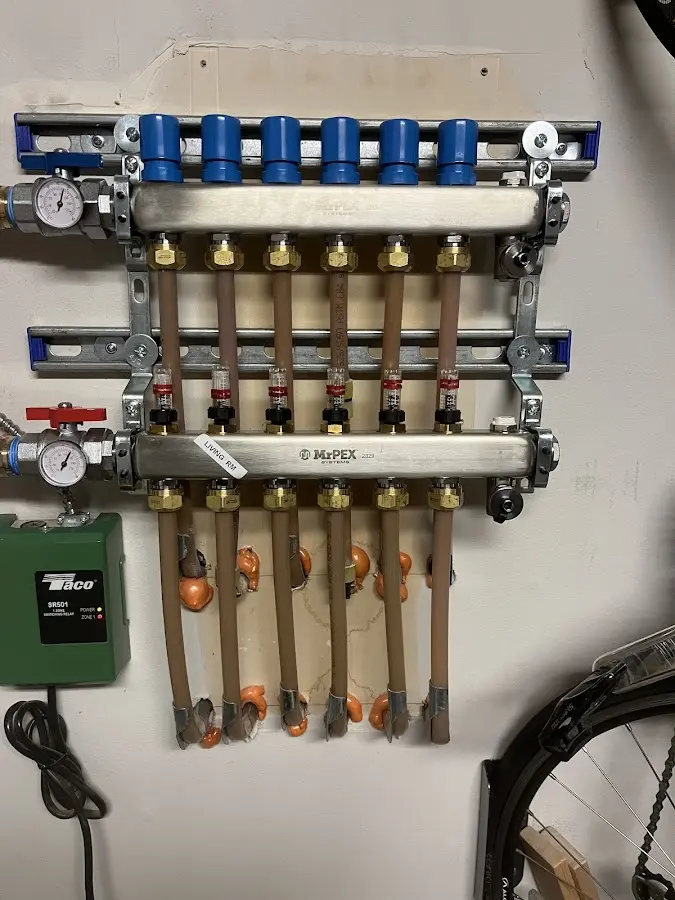 Plumber performing Leak Detection at a residential property in Dexter